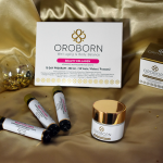 Pack de belleza OROBORN con los suplementos Beauty Collagen y la Crema facial hidratante, sobre tela dorada