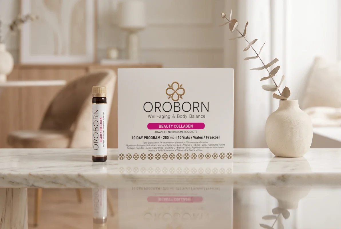 Caja y vial de OROBORN Beauty Collagen sobre una mesa de mármol