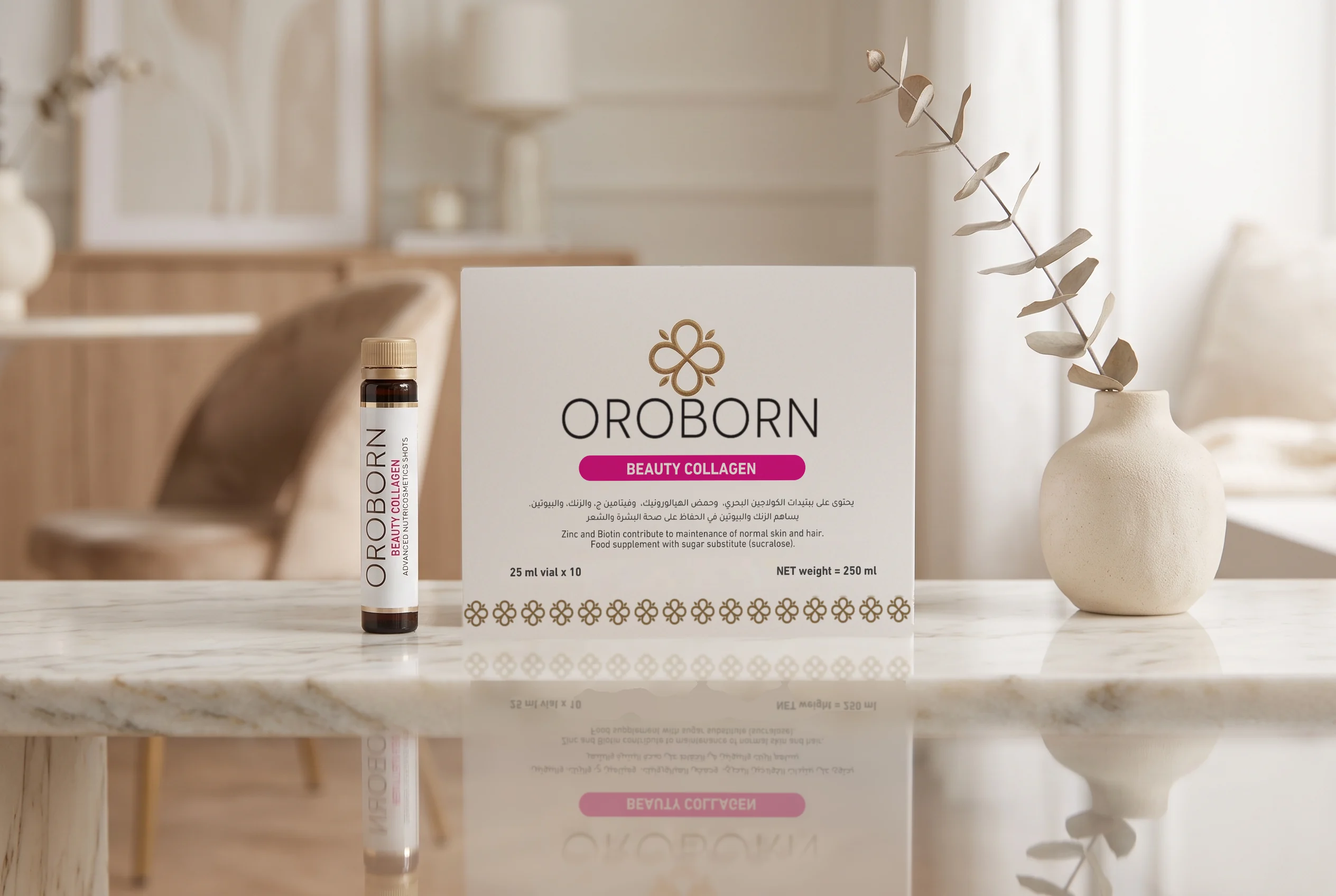 علبة وقارورة OROBORN Beauty Collagen بالعربية على طاولة رخامية